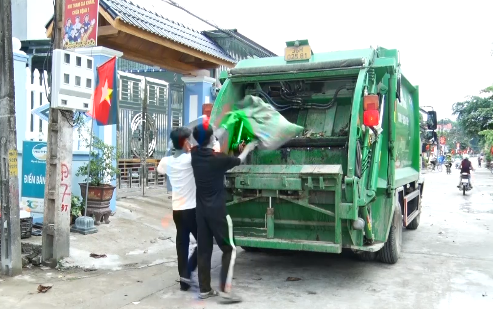 Huyện Thọ Xuân đẩy mạnh công tác xã hội hóa thu gom và xử lý rác thải sinh hoạt - Ảnh 4.