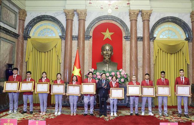 Chủ tịch nước biểu dương các 'gương mặt vàng' của Thể thao Việt Nam tại SEA Games 32 - Ảnh 3.