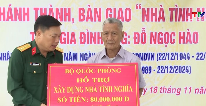 Ban Chỉ huy quân sự huyện Thọ Xuân tặng nhà tình nghĩa cho gia đình chính sách- Ảnh 1.