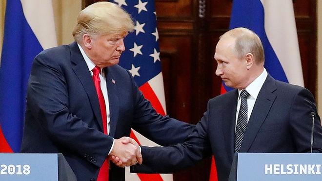 Tổng thống Mỹ - Nga tại cuộc gặp ở Helsinki. Ảnh: Reuters