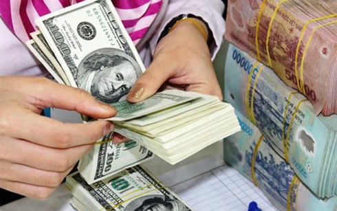 Nhu cầu ngoại tệ cho xuất khẩu và trả nợ vào các tháng cuối năm thường tăng nên gây áp lực đến tỷ giá. (Ảnh: VTV).