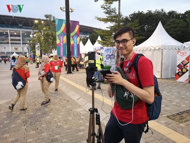 Các phóng viên có ngày làm việc bận rộn cùng lễ khai mạc ASIAD 2018.