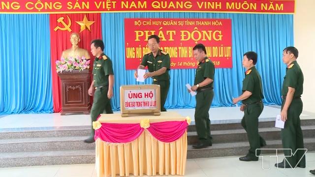 Bộ chỉ huy Quân sự tỉnh chuyển đến đồng bào huyện Mường Lát và huyện Quan Hoá mỗi huyện 100 triệu đồng và các mặt hàng nhu yếu phẩm