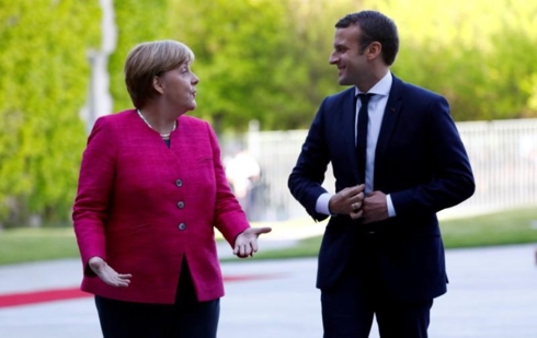  Tổng thống Pháp Emmanuel Macron và Thủ tướng Đức Angela Merkel. Ảnh: Reuters