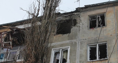 Nhà cửa tan hoang do xung đột kéo dài tại miền đông Ukraine. Ảnh: Sputnik.
