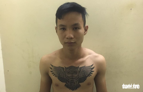 Nghi phạm Nguyễn Tiến Phúc lúc bị bắt - Ảnh: H.T