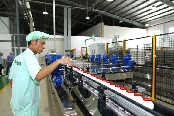 Tại dây chuyền sản xuất của NutiFood, một doanh nghiệp hướng ngoại mạnh thời gian qua - Ảnh: T.DỊU
