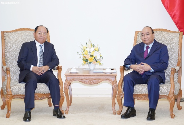 Thủ tướng Nguyễn Xuân Phúc tiếp Bộ trưởng Nội vụ Lào Khammanh Sounvileuth.