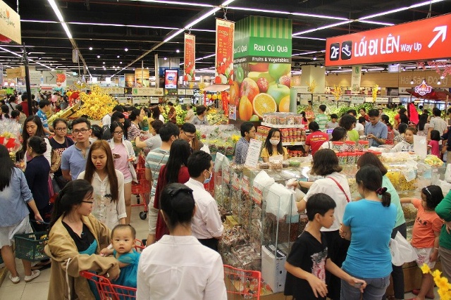 Không khí mua sắm hàng Tết tại Hà Nội, TP HCM đang rất nhộn nhịp. (Ảnh minh họa: KT)