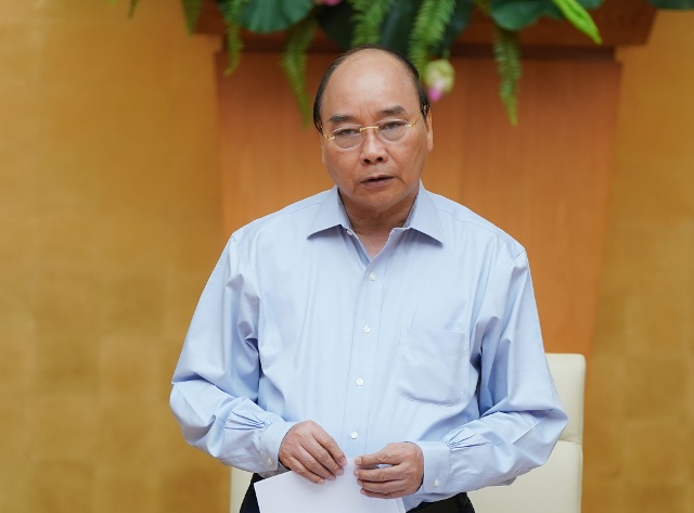 Thủ tướng Nguyễn Xuân Phúc phát biểu kết luận cuộc họp - Ảnh: VGP/Quang Hiếu
