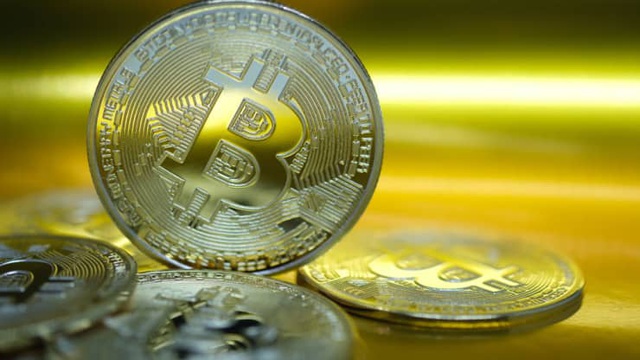 Giá bitcoin vẫn tăng  &quot;điên cuồng &quot; và chưa có dấu hiệu dừng lại (Ảnh: Getty)