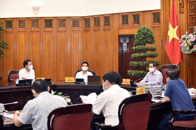 Thủ tướng Chính phủ Phạm Minh Chính làm việc với Bộ Thông tin và Truyền thông chiều ngày 11.5. Ảnh: Nhật Bắc