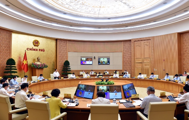 Thủ tướng Phạm Minh Chính: Kiểm soát tốt dịch bệnh là yếu tố quyết định phục hồi kinh tế - Ảnh: VGP/Nhật Bắc