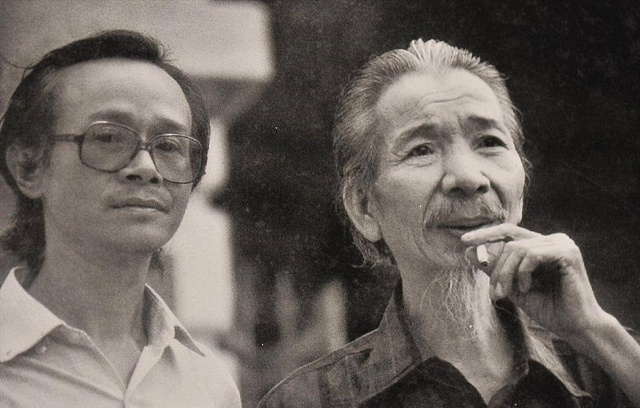 Nhạc sĩ Trịnh Công Sơn (trái), nhạc sĩ Văn Cao.