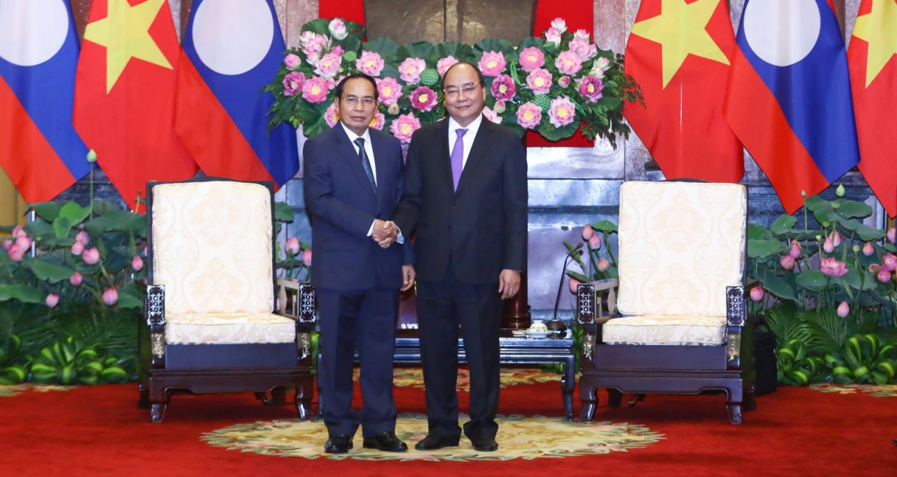 Chiều 17/7/2022, Chủ tịch nước Nguyễn Xu&acirc;n Ph&uacute;c tiếp đồng ch&iacute; Bounthong Chitmany, Ủy vi&ecirc;n Bộ Ch&iacute;nh trị, Thường trực Ban B&iacute; thư Trung ương Đảng Nh&acirc;n d&acirc;n C&aacute;ch mạng L&agrave;o, Ph&oacute; Chủ tịch nước CHDCND L&agrave;o thăm ch&iacute;nh thức Việt Nam. (Ảnh: TTXVN)