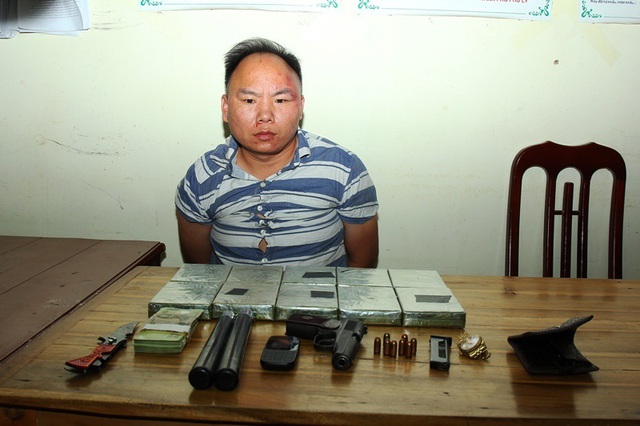 Bắt giữ đối tượng mang súng K59 vận chuyển 10 bánh heroin - 2 Bắt giữ đối tượng mang súng K59 vận chuyển 10 bánh heroin - 2