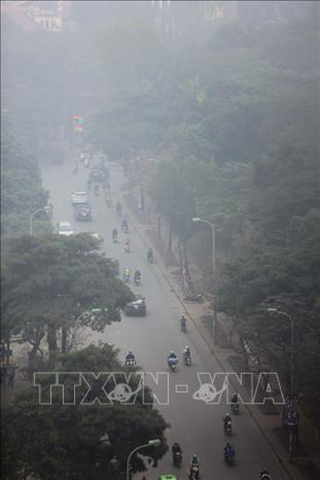 Không khí Hà Nội ô nhiễm ở mức nghiêm trọng - 2
