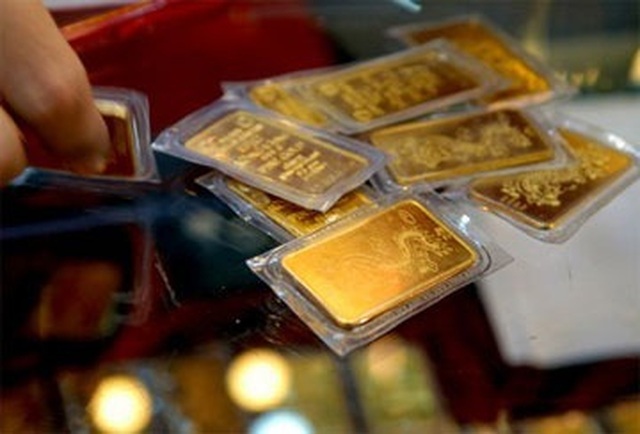 Giá vàng bật tăng sát mốc 49 triệu đồng/lượng - 1